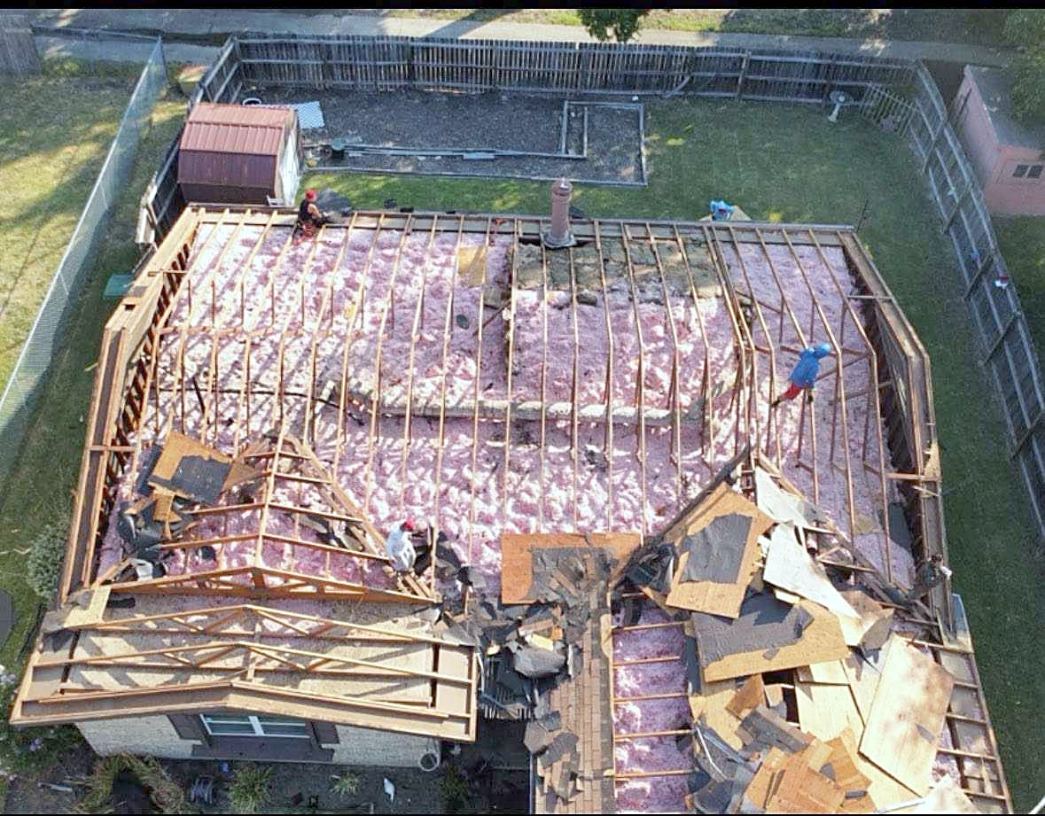 A roof stripped to the decking during a tear-off